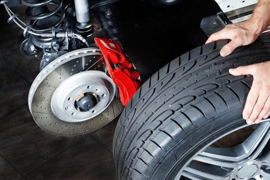 Changing a tyre in a garage